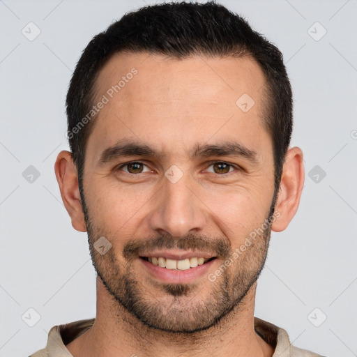 Joyful white young-adult male with short  black hair and brown eyes