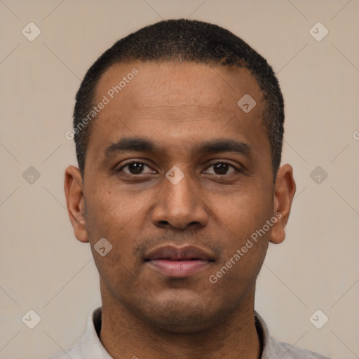 Neutral latino young-adult male with short  black hair and brown eyes