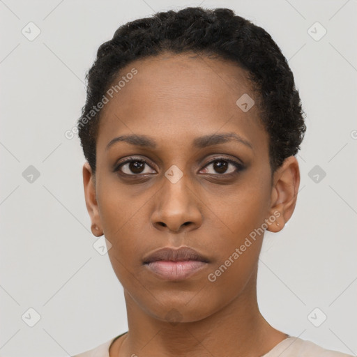 Neutral black young-adult female with short  black hair and brown eyes