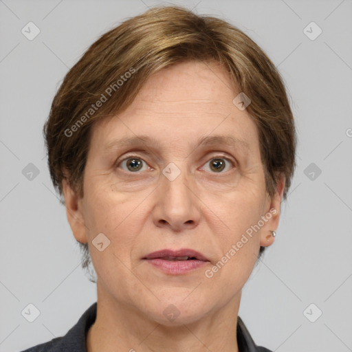 Joyful white adult female with medium  brown hair and grey eyes