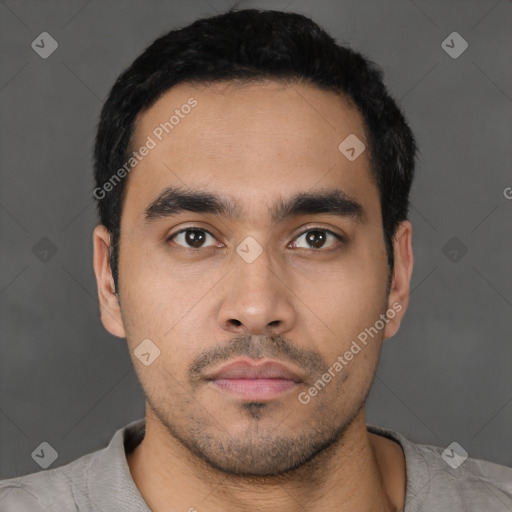 Neutral latino young-adult male with short  black hair and brown eyes