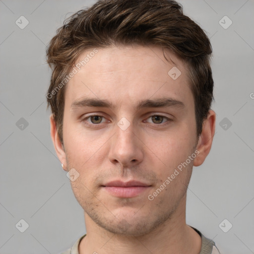 Neutral white young-adult male with short  brown hair and grey eyes