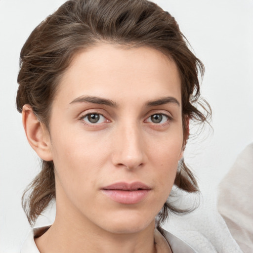 Neutral white young-adult female with medium  brown hair and brown eyes