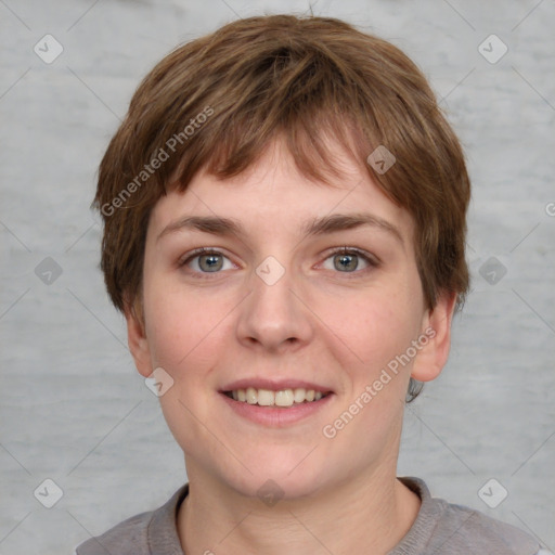 Joyful white young-adult female with short  brown hair and grey eyes