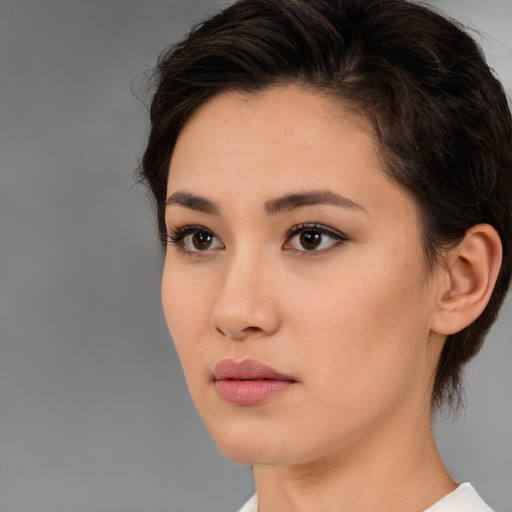 Neutral white young-adult female with medium  brown hair and brown eyes
