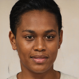 Joyful black young-adult female with short  brown hair and brown eyes