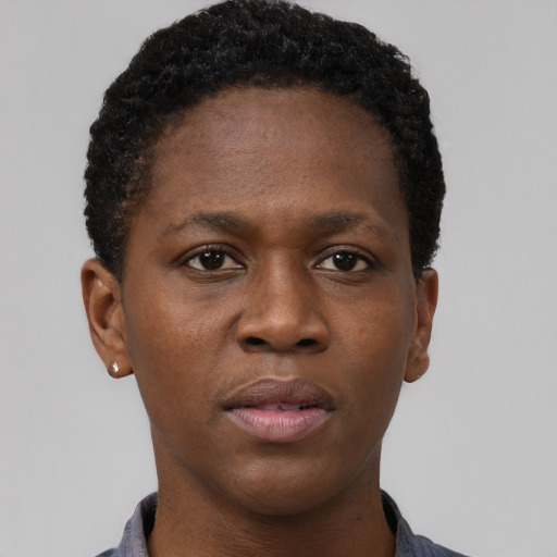 Neutral black young-adult female with short  brown hair and brown eyes