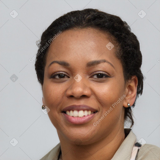 Joyful latino young-adult female with short  black hair and brown eyes