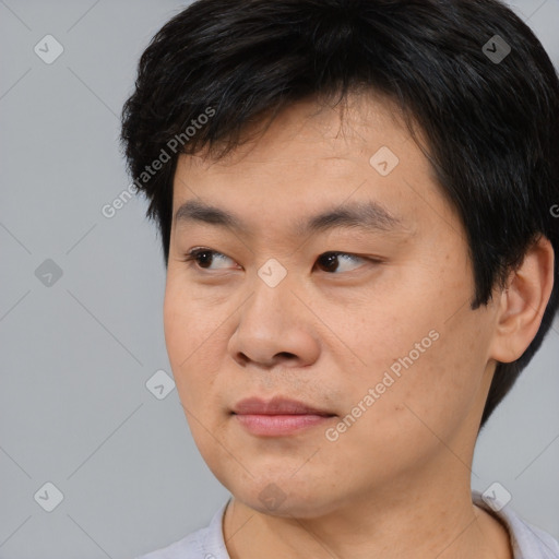 Neutral asian young-adult male with short  black hair and brown eyes
