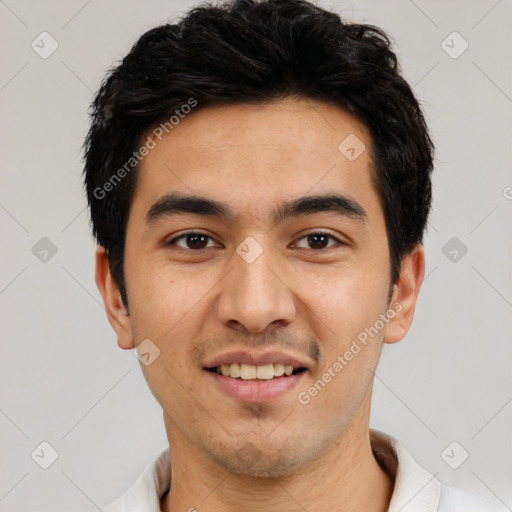 Joyful white young-adult male with short  black hair and brown eyes