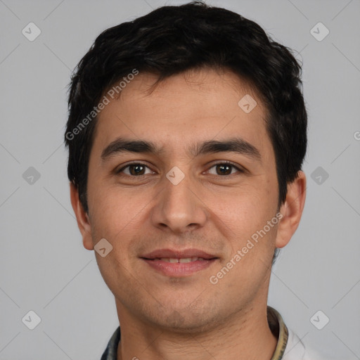 Joyful white young-adult male with short  black hair and brown eyes