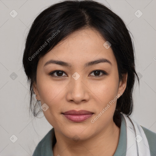 Joyful asian young-adult female with medium  black hair and brown eyes