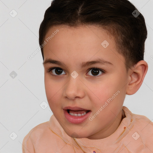 Joyful white child female with short  brown hair and brown eyes