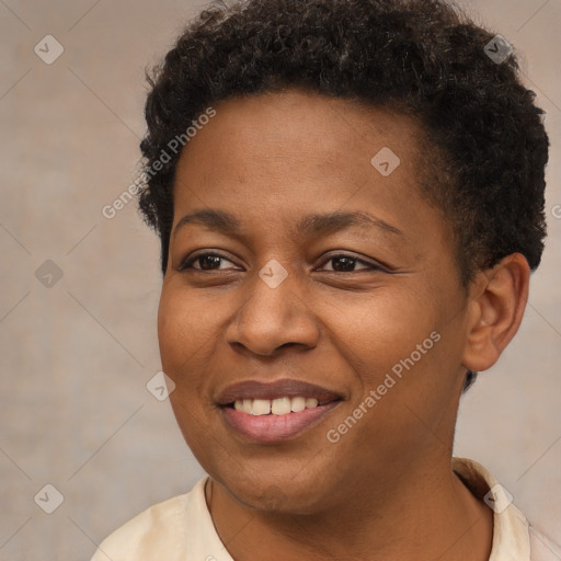 Joyful black young-adult female with short  brown hair and brown eyes