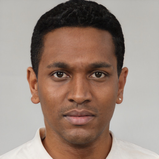 Neutral black young-adult male with short  black hair and brown eyes