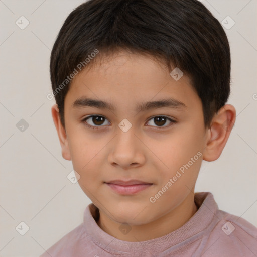 Joyful white child male with short  brown hair and brown eyes