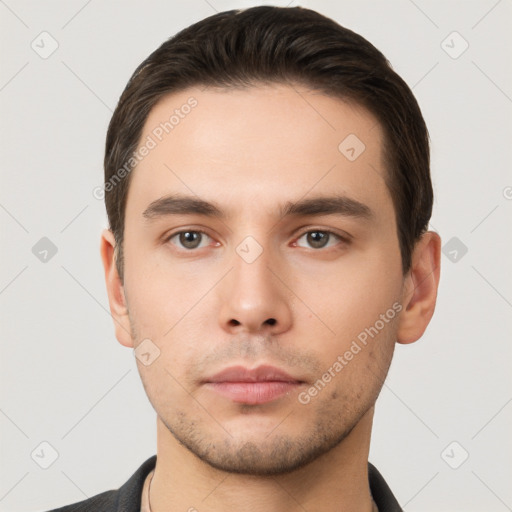 Neutral white young-adult male with short  brown hair and brown eyes