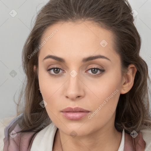 Neutral white young-adult female with long  brown hair and brown eyes