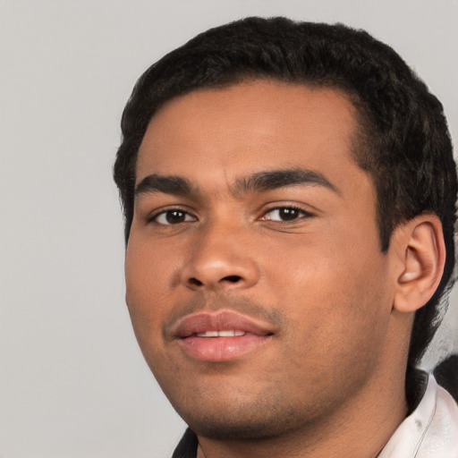 Neutral white young-adult male with short  black hair and brown eyes