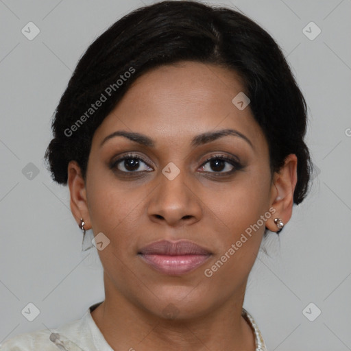 Joyful black young-adult female with short  brown hair and brown eyes