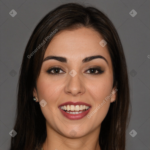 Joyful white young-adult female with long  brown hair and brown eyes