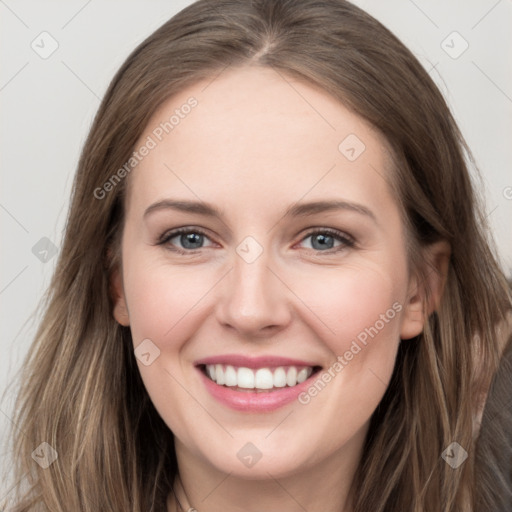 Joyful white young-adult female with long  brown hair and grey eyes