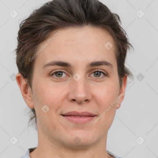 Joyful white adult female with short  brown hair and brown eyes