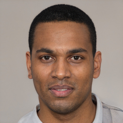 Neutral black young-adult male with short  black hair and brown eyes