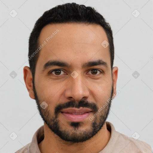 Joyful latino young-adult male with short  black hair and brown eyes