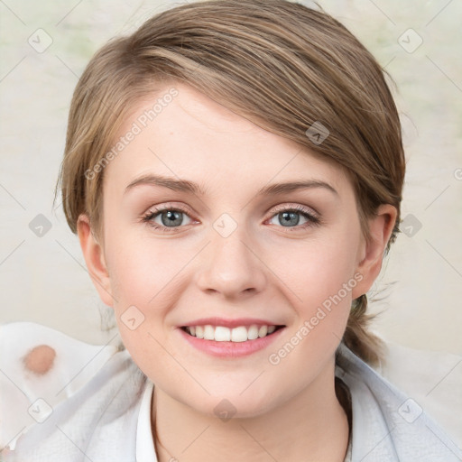 Joyful white young-adult female with medium  brown hair and blue eyes