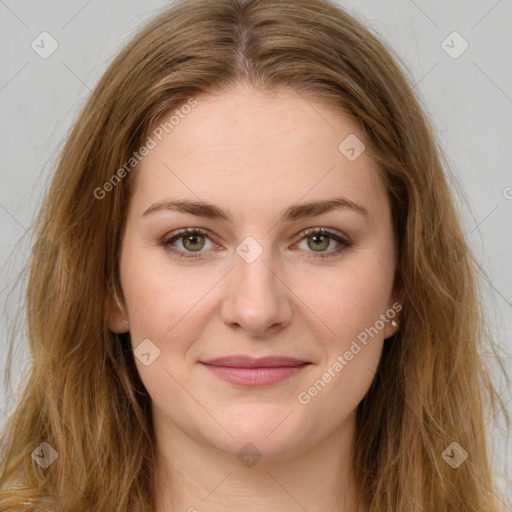 Joyful white young-adult female with long  brown hair and green eyes