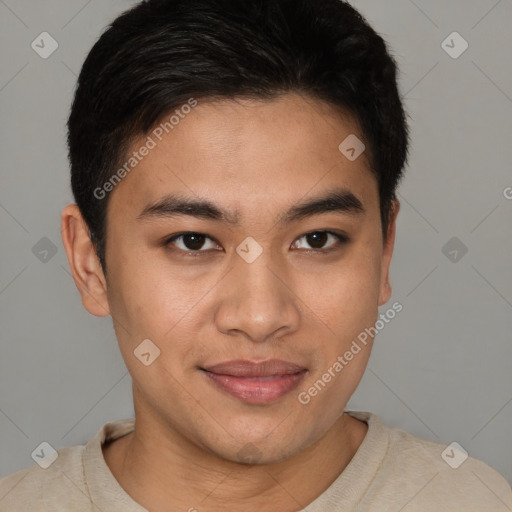 Joyful asian young-adult male with short  brown hair and brown eyes