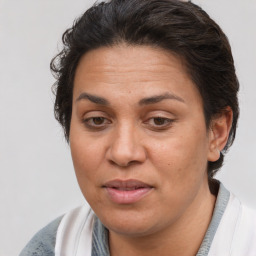 Joyful white adult female with short  brown hair and brown eyes