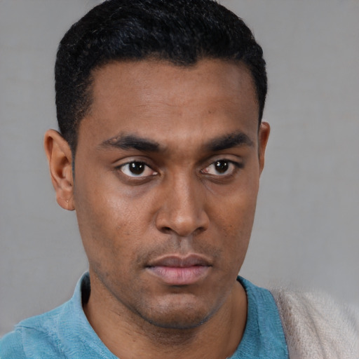 Neutral latino young-adult male with short  black hair and brown eyes