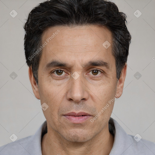 Neutral white adult male with short  black hair and brown eyes