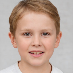 Joyful white child female with short  brown hair and brown eyes