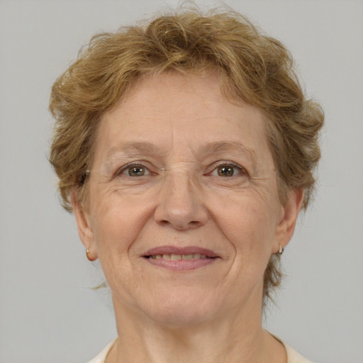 Joyful white middle-aged female with short  brown hair and brown eyes