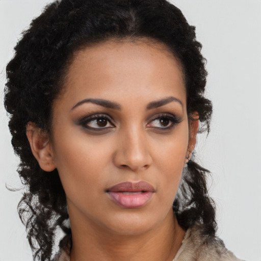 Neutral latino young-adult female with long  brown hair and brown eyes