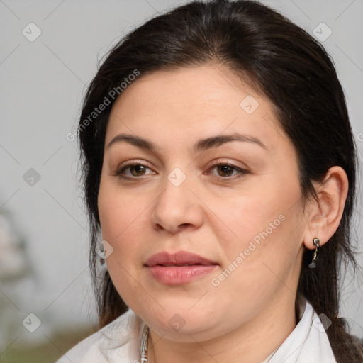 Joyful white adult female with medium  brown hair and brown eyes