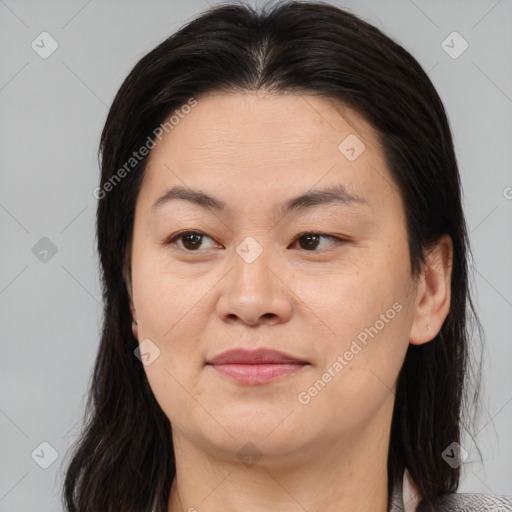 Joyful asian young-adult female with medium  brown hair and brown eyes