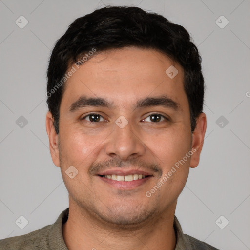 Joyful white young-adult male with short  black hair and brown eyes