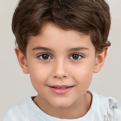 Joyful white child male with short  brown hair and brown eyes