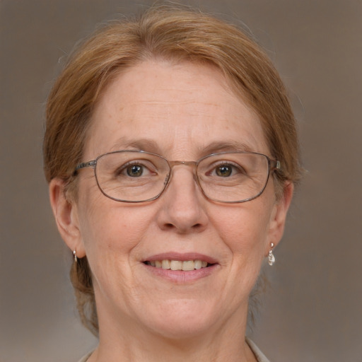 Joyful white middle-aged female with medium  brown hair and blue eyes