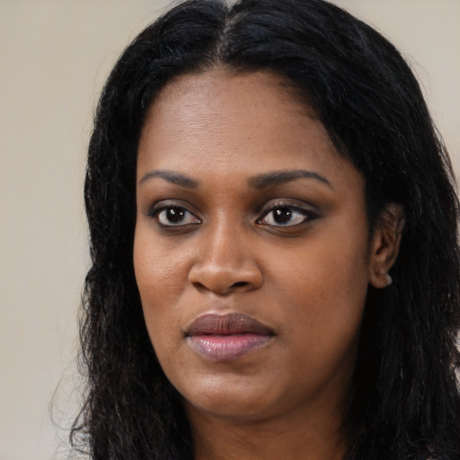 Neutral latino young-adult female with long  black hair and brown eyes
