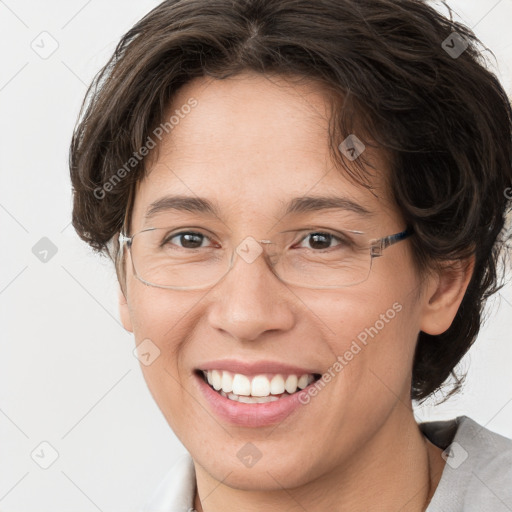 Joyful white adult female with short  brown hair and grey eyes