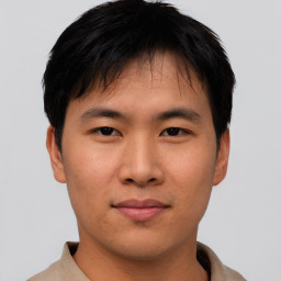 Neutral asian young-adult male with short  brown hair and brown eyes