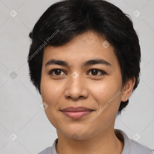 Joyful asian young-adult female with short  black hair and brown eyes