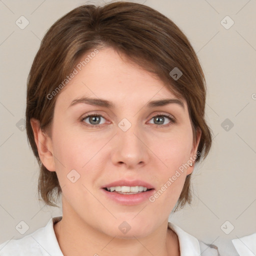 Joyful white young-adult female with medium  brown hair and grey eyes