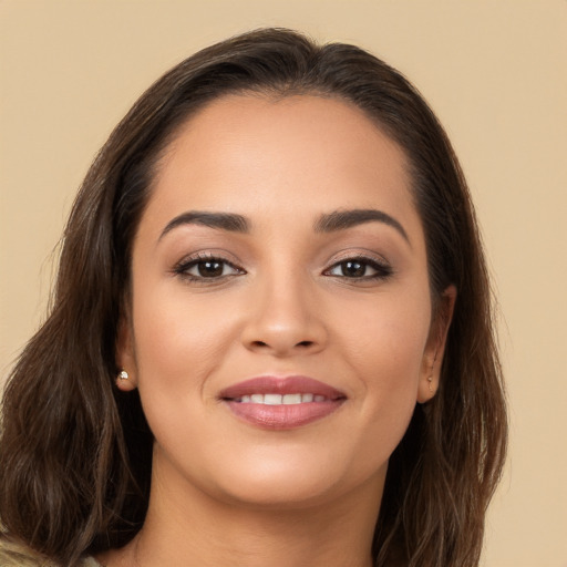 Joyful white young-adult female with long  brown hair and brown eyes