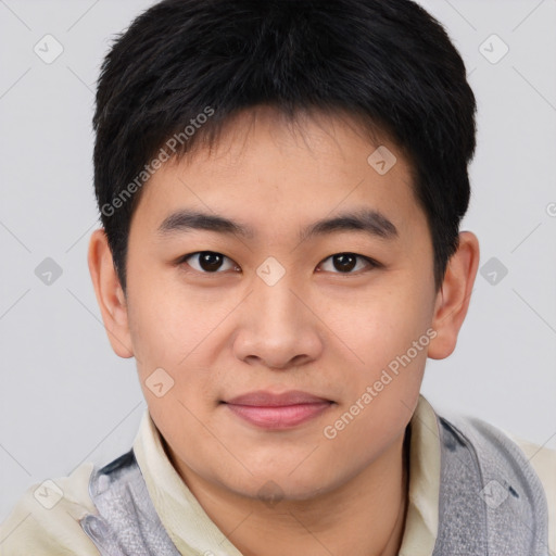 Joyful asian young-adult male with short  black hair and brown eyes